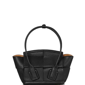 Sure! Here’s an optimized title for the e-commerce product:

Arco Mini Grain Leather Handbag - Black & Gold Accent - Stylish and Compact Design for Everyday Use

Feel free to adjust any specific terms to better fit your brands voice!